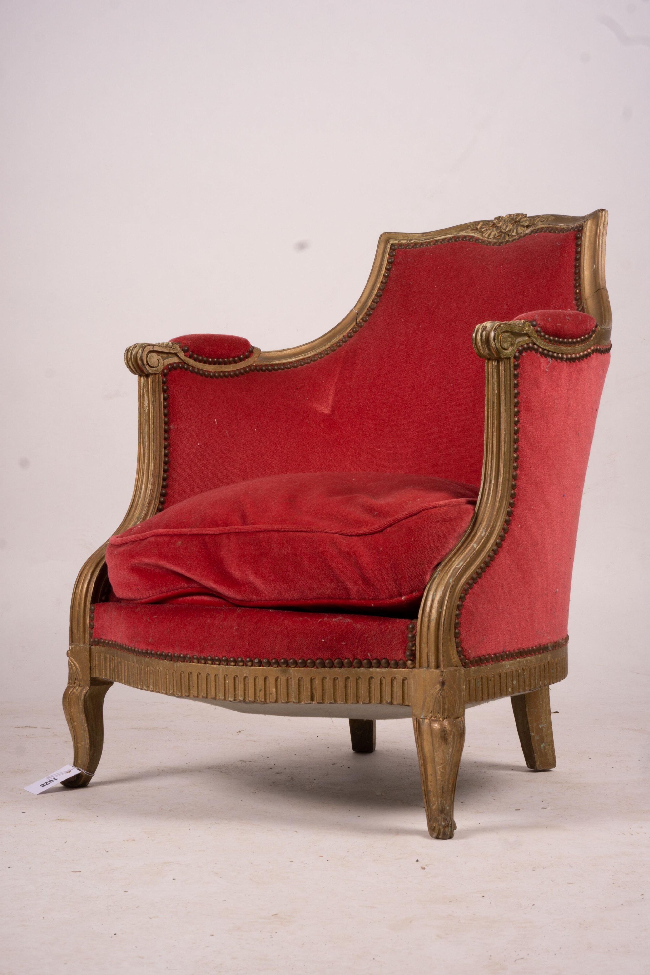 A late 19th century French giltwood tub shaped side chair, width 61cm, depth 62cm, height 78cm